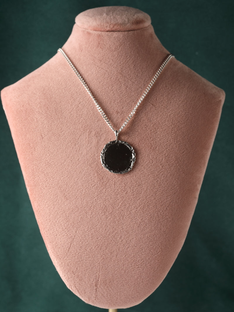 Zilveren ketting en ronde hanger: Felice