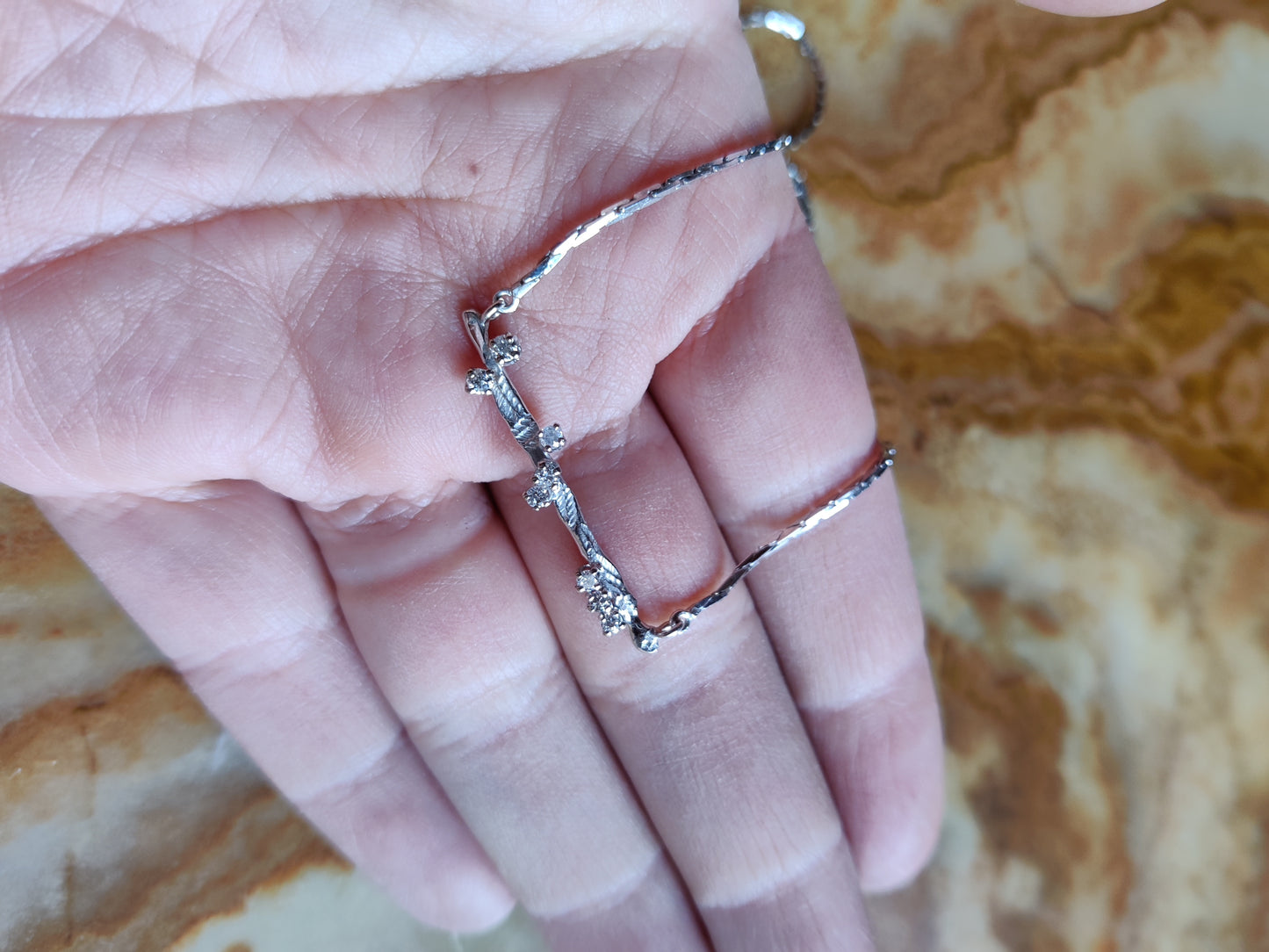 Ketting in 18k wit goud met diamant: op maat gemaakt.