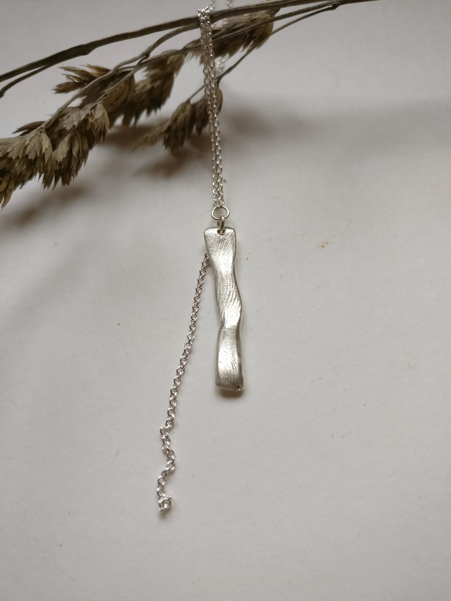 Ketting in zilver met vingerafdrukken: op maat gemaakt