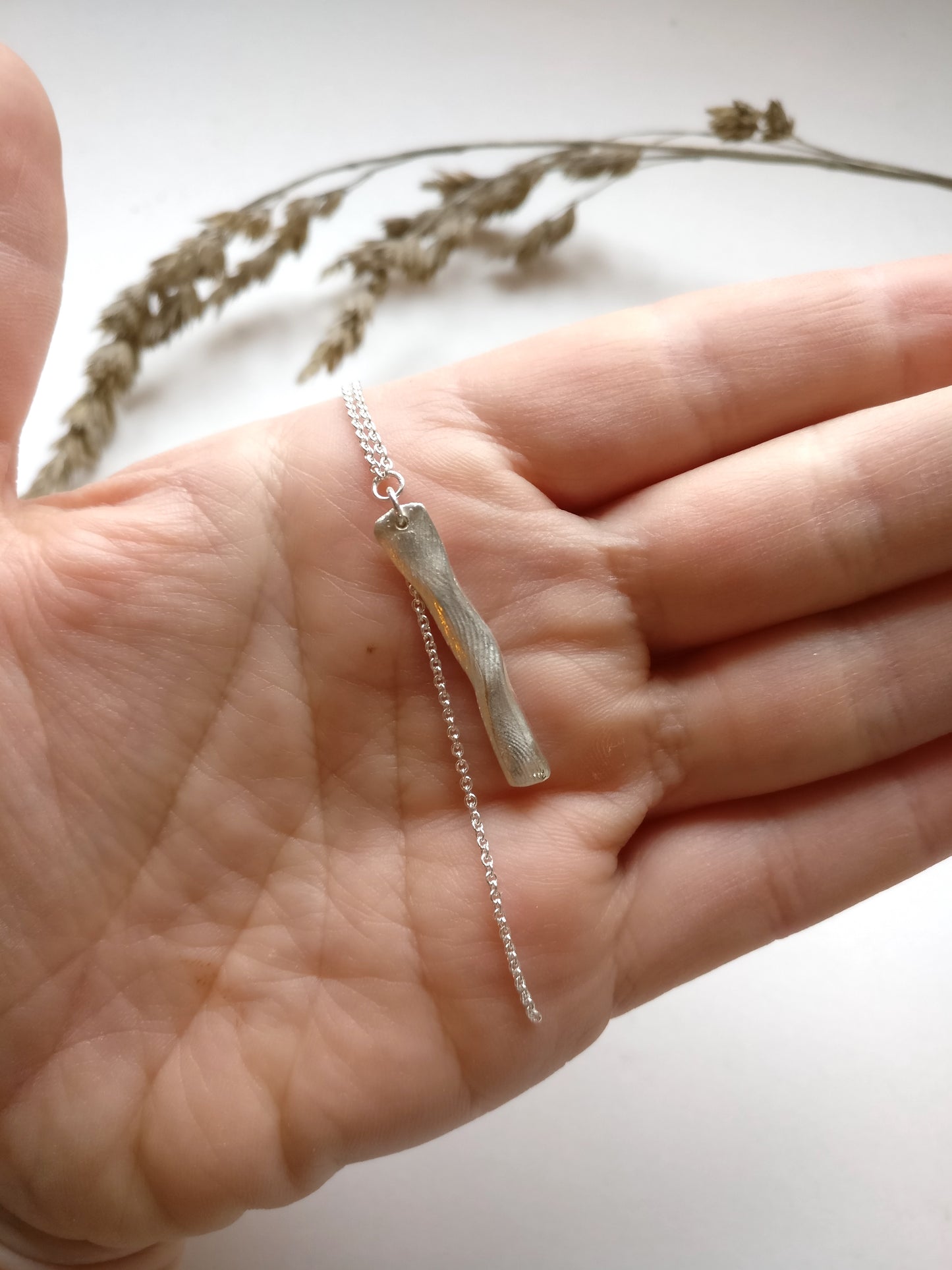 Ketting in zilver met vingerafdrukken: op maat gemaakt