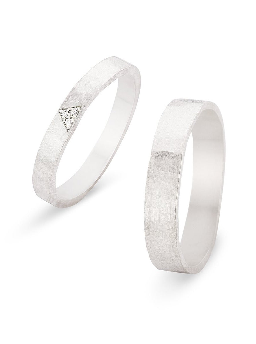 Trouwringen in 18k wit goud met diamant: Yoko en John
