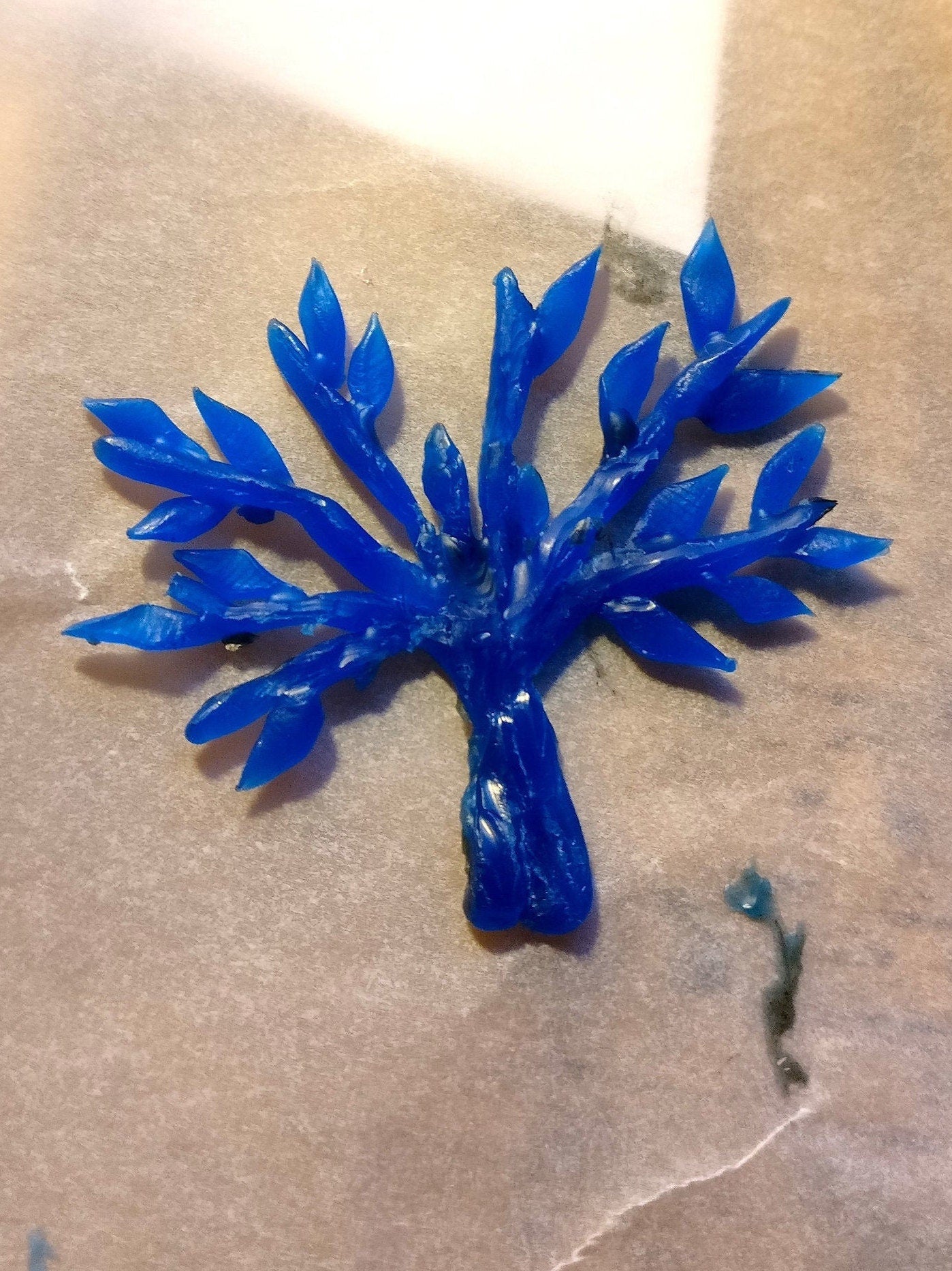 Broche in zilver: op maat gemaakt.