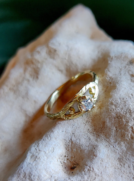 gouden verlovingsring met ronde diamant