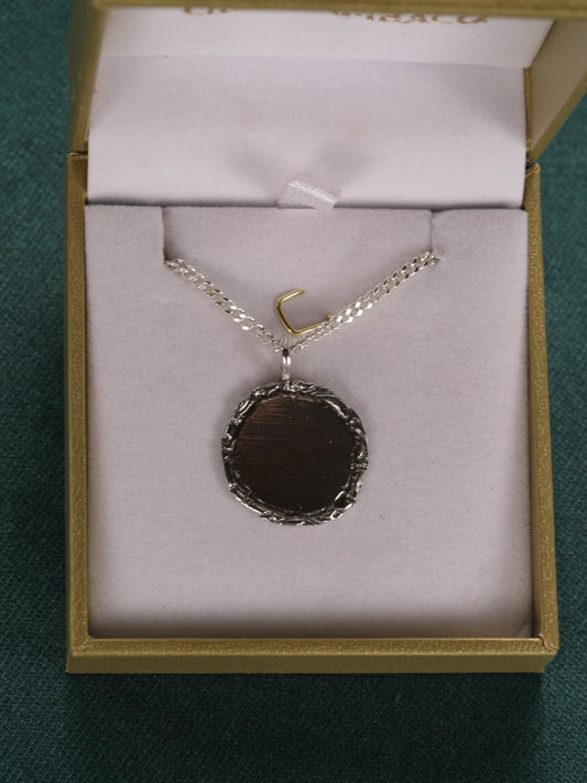 Zilveren ketting en ronde hanger: Felice