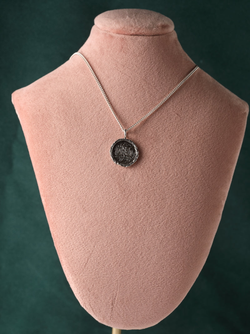 Zilveren ketting en ronde hanger: Dream